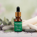Bottle of 'Stress Away Blend' from earthEssentials with a dropper on a natural background.