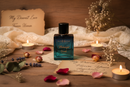 Blue bottle of Earth Essentials Midnight Scent on a white background